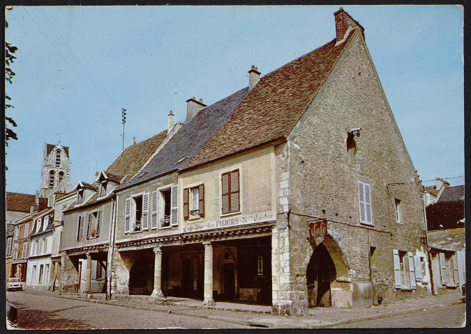 Etampes.- Les piliers [maison] place Saint-Gilles (20 mars 1986). 