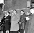 Dominique MARNY (à gauche), Jean MARAIS, Edouard DERMIT et autres membres de la famille COCTEAU sont dans la rue nouvellement rebaptisée, et écoutent le discours prononcé, 22 mars 1964, négatif noir et blanc, 1964.
