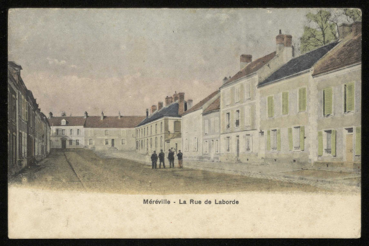 MEREVILLE. - Rue de Laborde. [Editeur A. Bréger frères, Paris, 1917, colorisée.) 