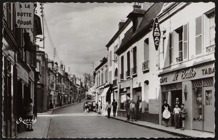 Arpajon.- La grande rue (14 août 1956). 